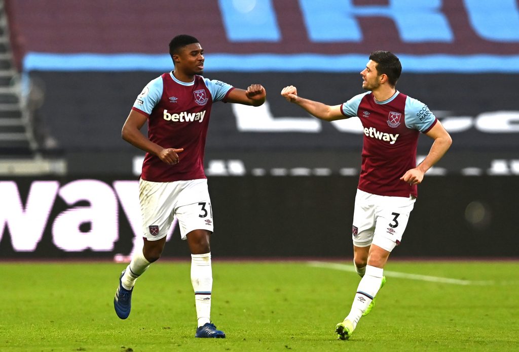 Ben-Johnson-and-Aaron-Cresswell-celebrate-scoring-for-West-Ham