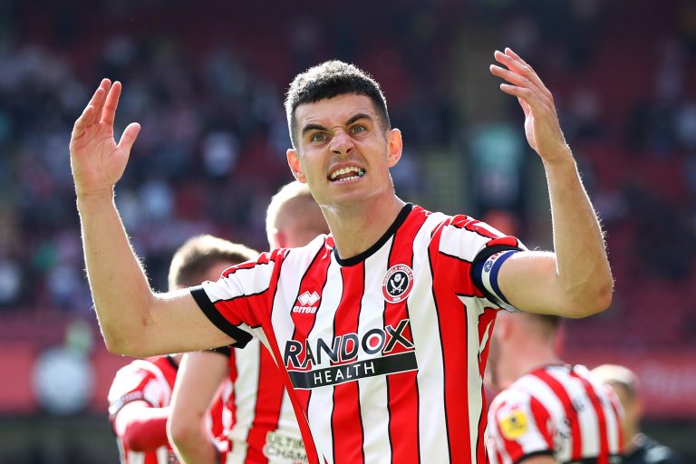 John Egan gestures to supporters