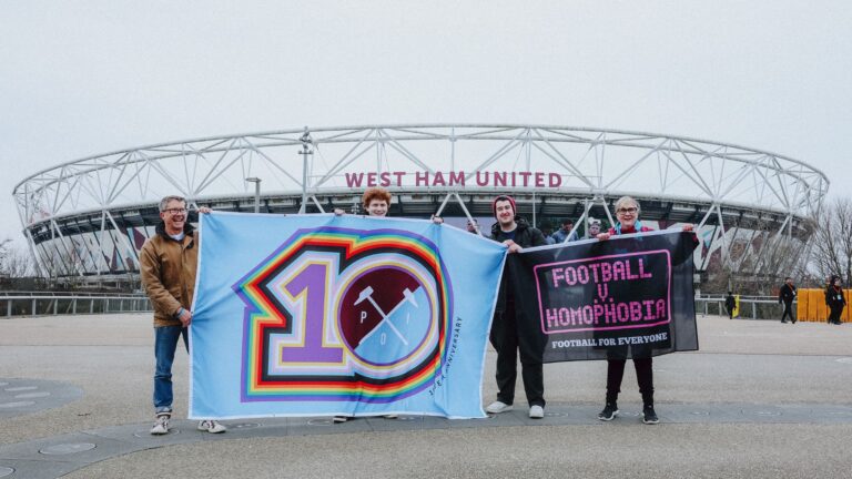Pride of Irons supporters outside London Stadium with Pride flags