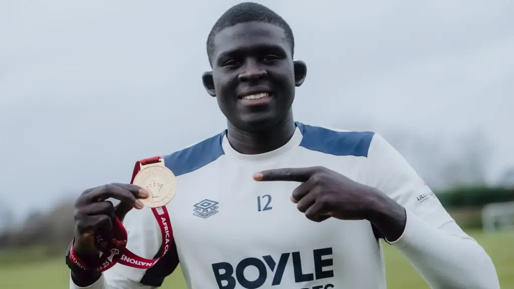 Malick Diouf with his AFCON medal